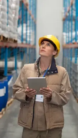 Warehouse worker responding to overhead paging announcement